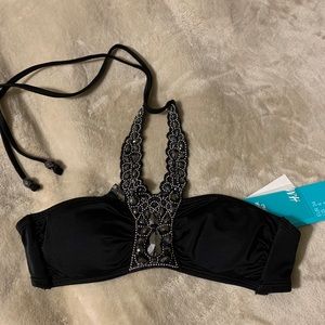 Woman’s black beaded bikini top